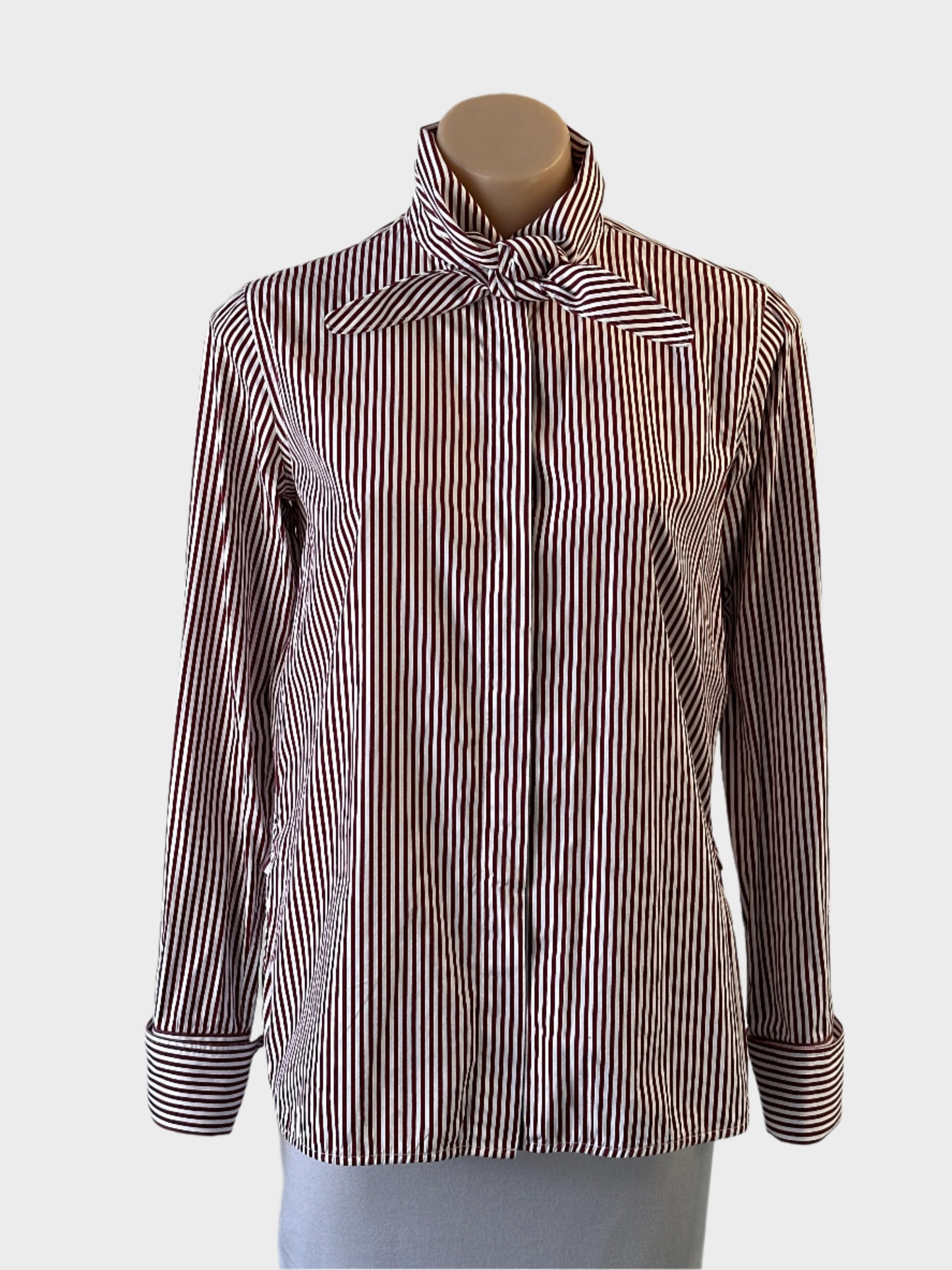 Designer Scanlan Theodore shirt in red and white stripe cotton with cravat tie and shirt tail hem for office wear.