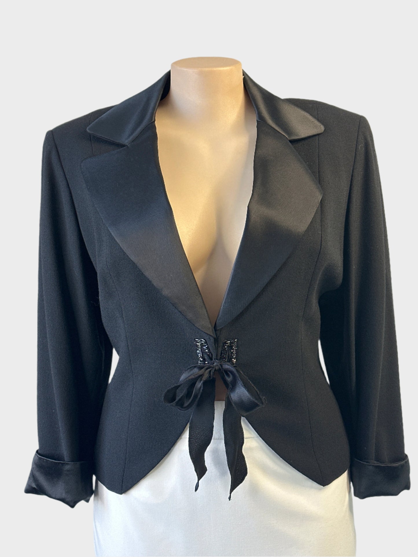 Designer Anthea Crawford jacket in black with satin shawl collar and beaded tie front for evening wear.
