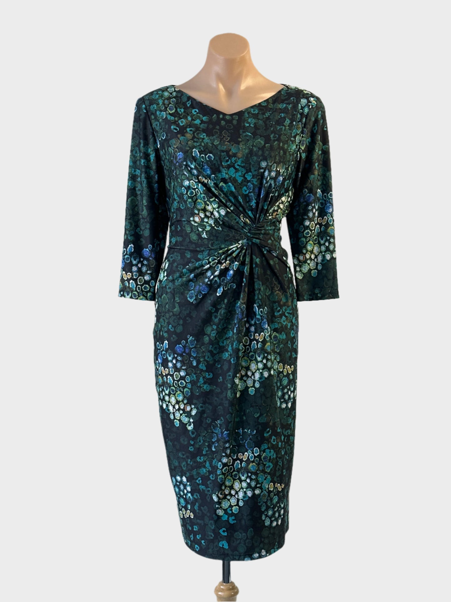 Designer Anthea Crawford sheath dress in black and green dot print with draped skirt for office or special events wear.