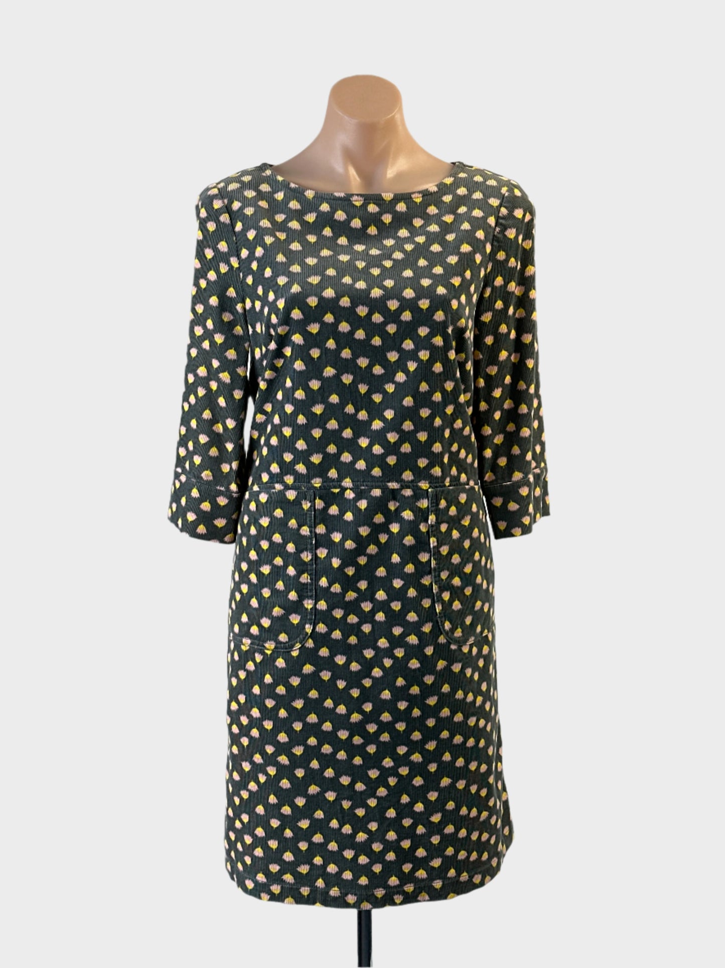 Designer Boden shift dress in green and pink blossom print with patch pockets for smart casual wear.