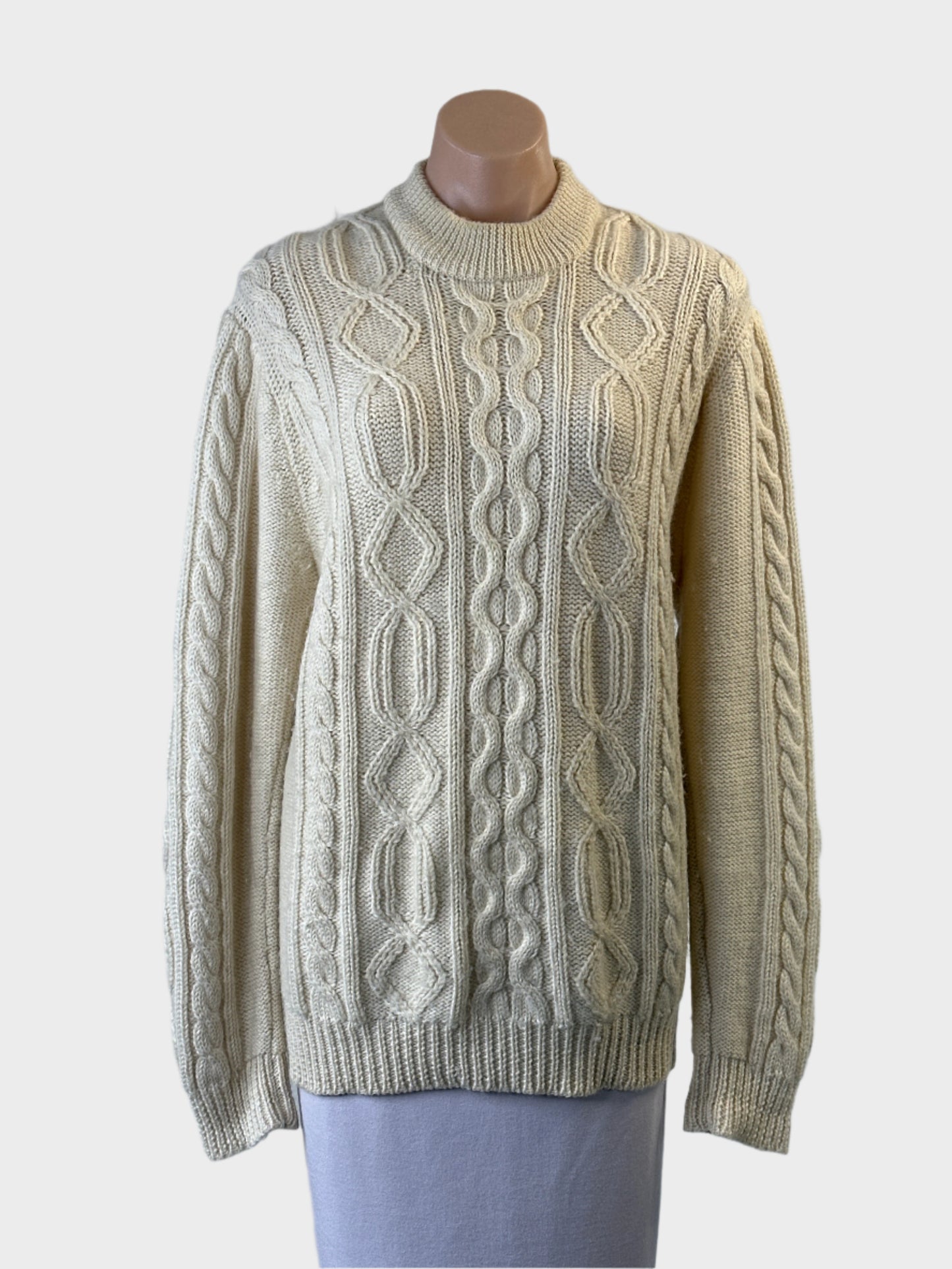 Classic cream long line cable knit sweater with crew neck and rib trim for smart casual wear.