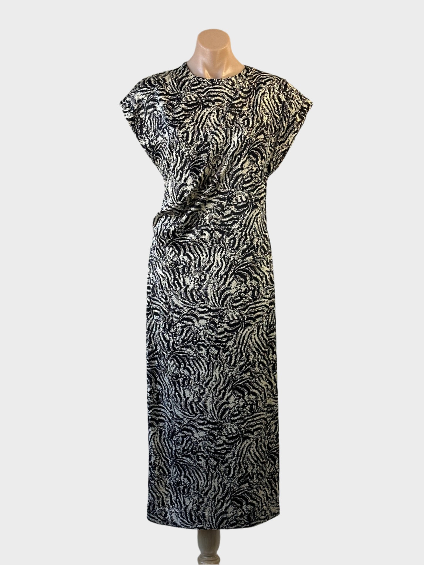 COS dress in cream and black abstract animal print with cap sleeves and gathered waist for evening or special events wear.