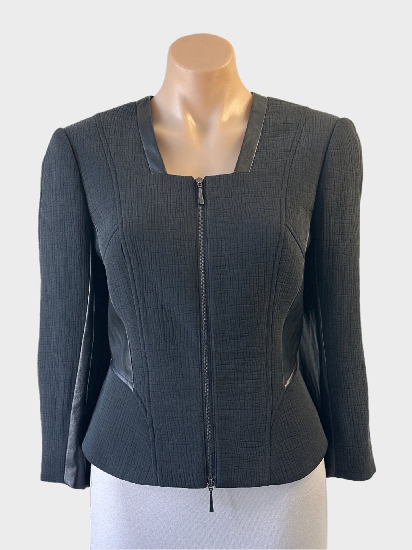 David Lawrence Atelier black zip front jacket in textured weave with faux leather trim for office or evening wear.