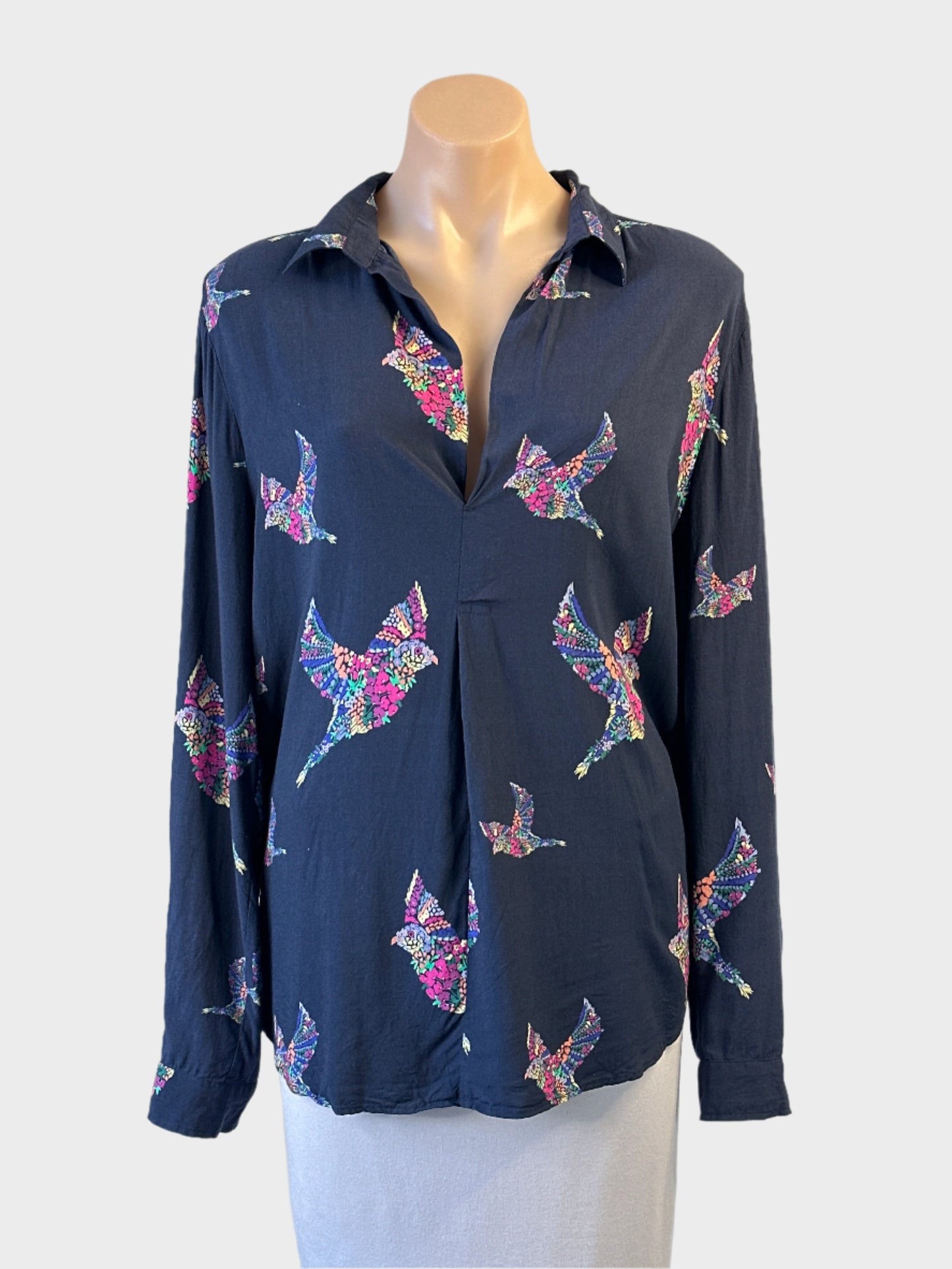 Designer French Connection navy and multicoloured floral bird top with pleat and curved hem for smart casual wear.