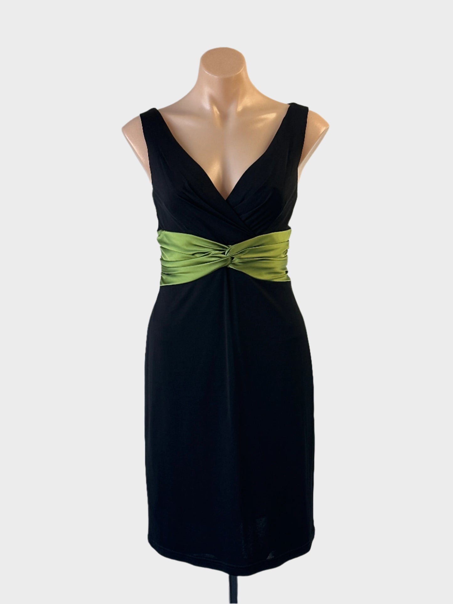 Designer Kay Unger black and green sleeveless sheath dress in sheer jersey with twist front for evening or formal wear