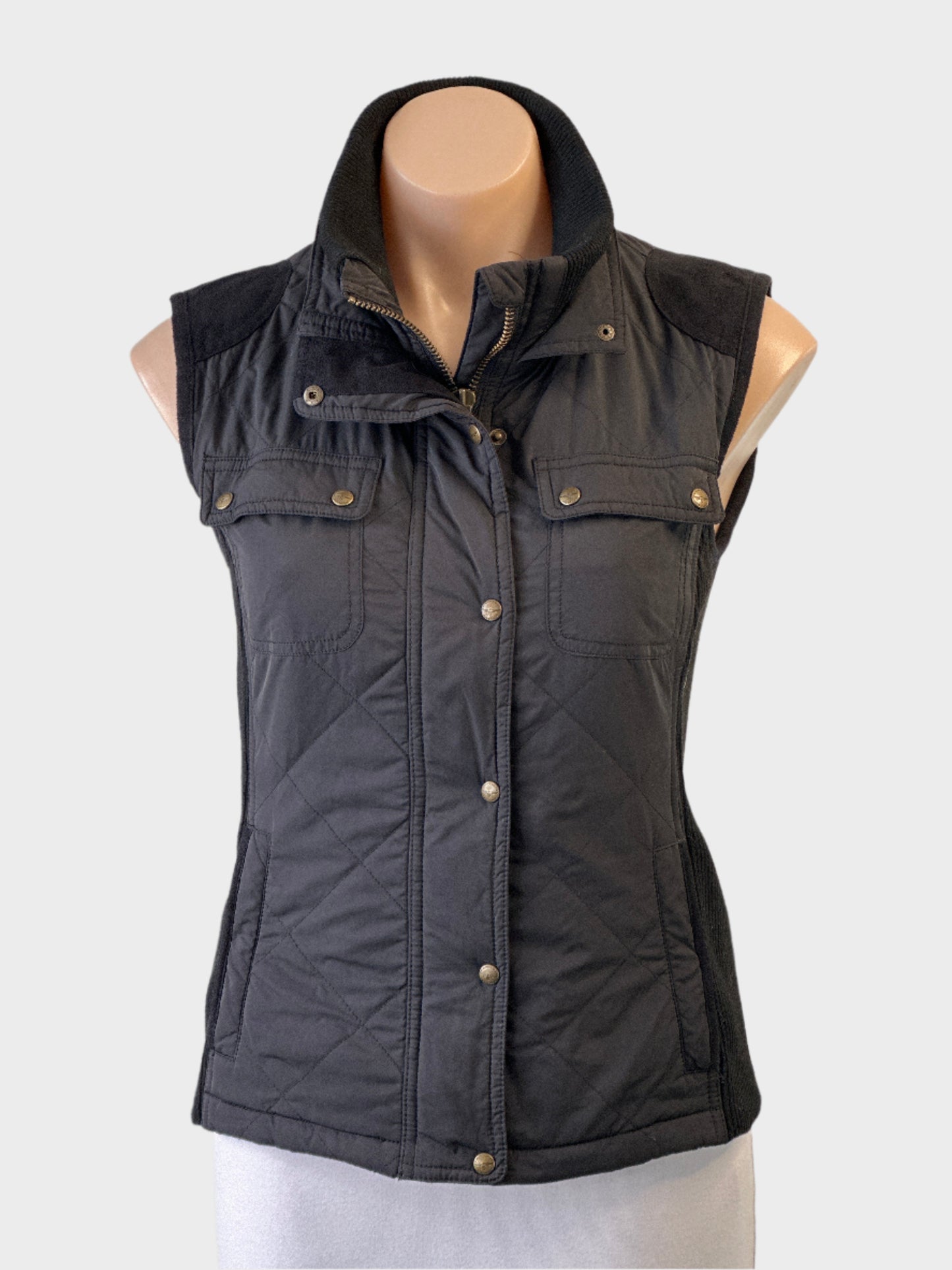 Designer R.M.WILLIAMS black quilted vest with suede trim and flap pockets for smart casual wear.