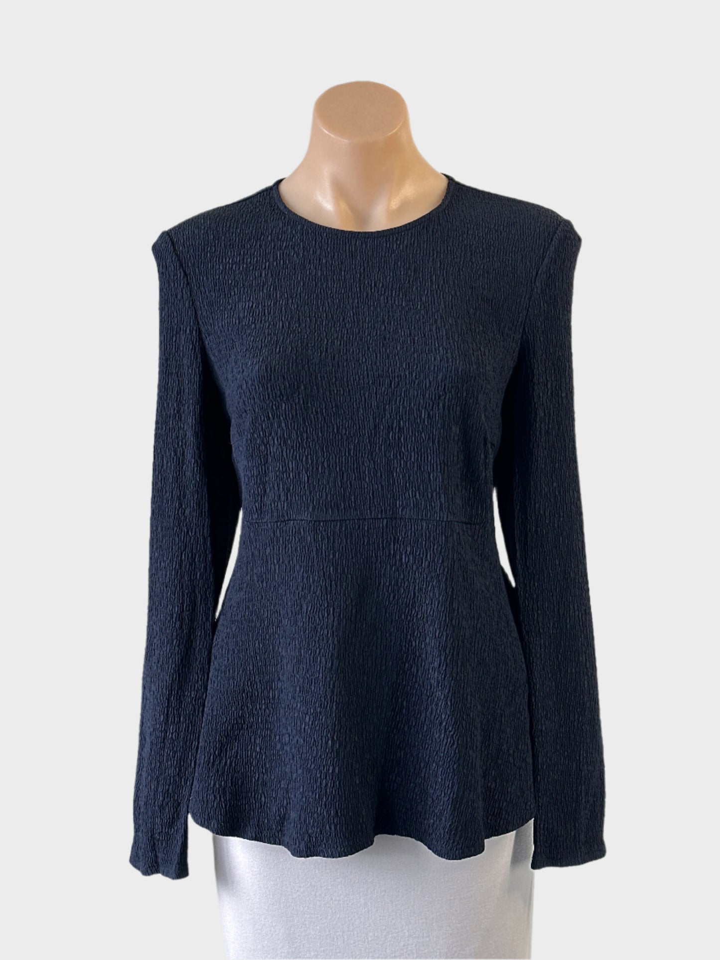 Designer Scanlan Theodore navy blue peplum top in puckered weave with round neck for office wear.