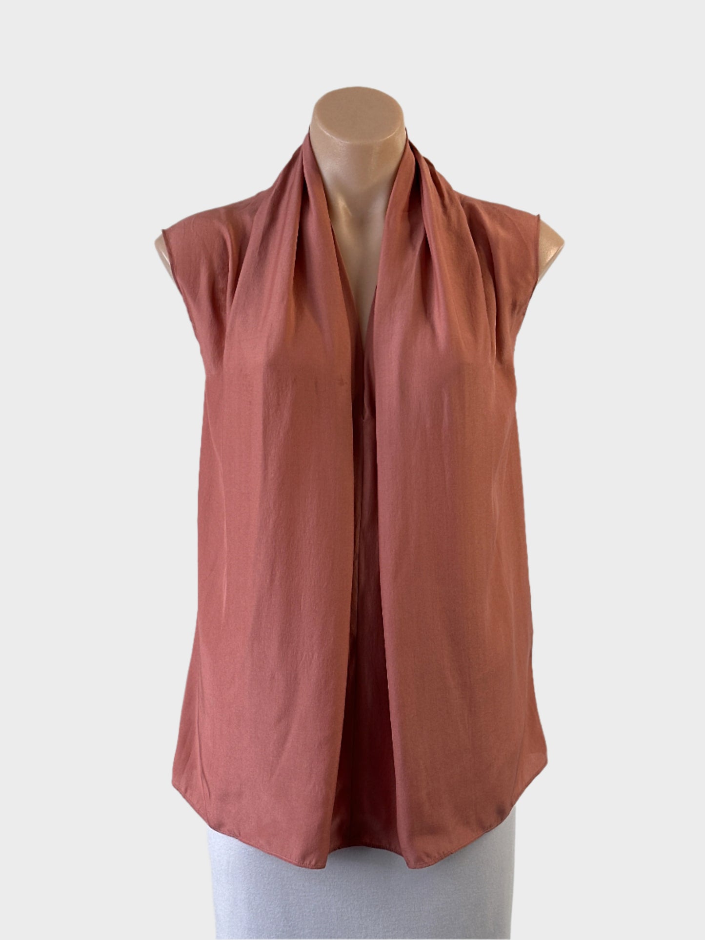 Designer Scanlan Theodore pink sleeveless charmeuse silk top with draped front for office or special events.