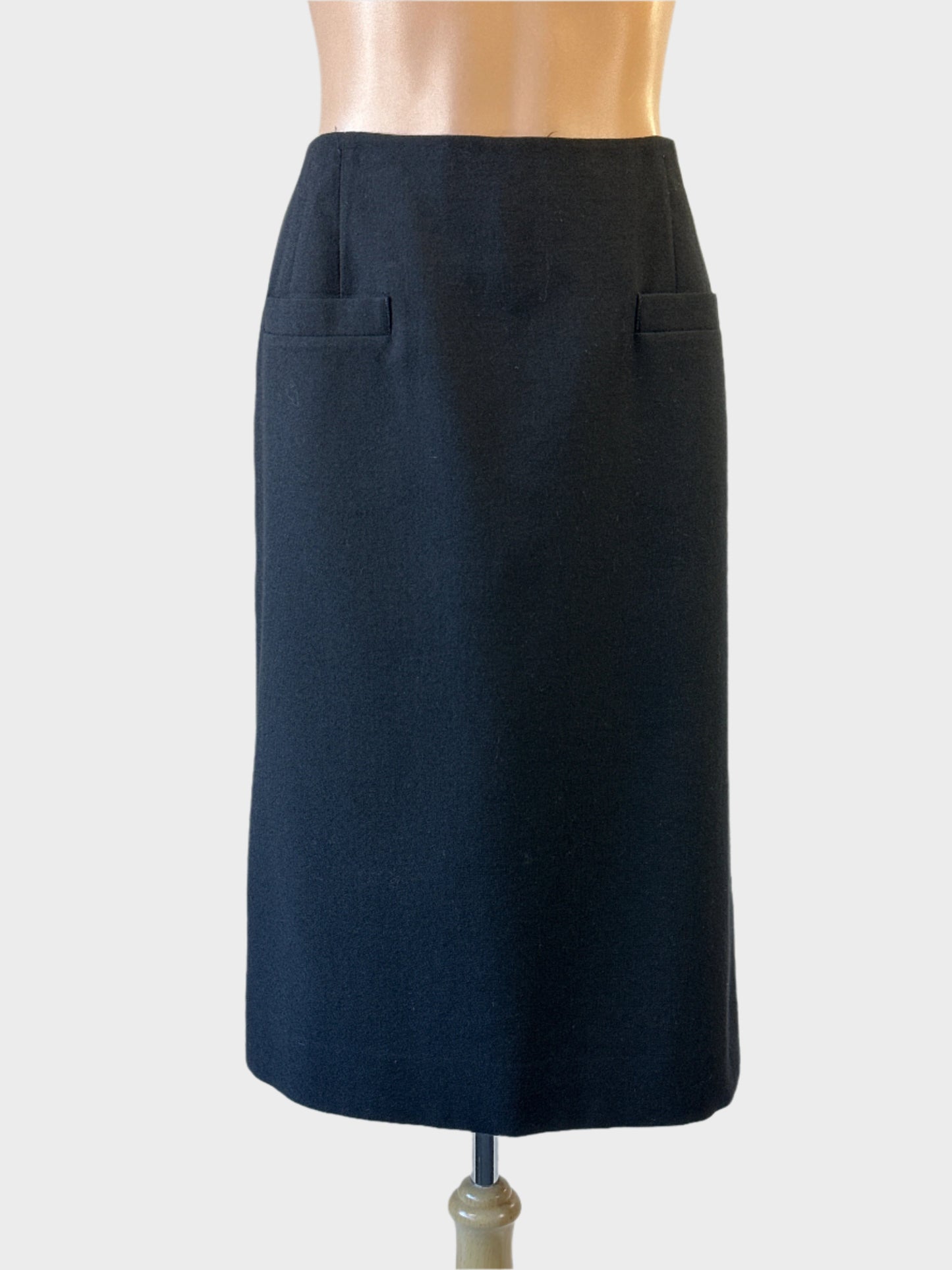 Fletcher Jones vintage 90s black straight skirt with welt pockets, contour waist and twin back vents, ideal for office wear.