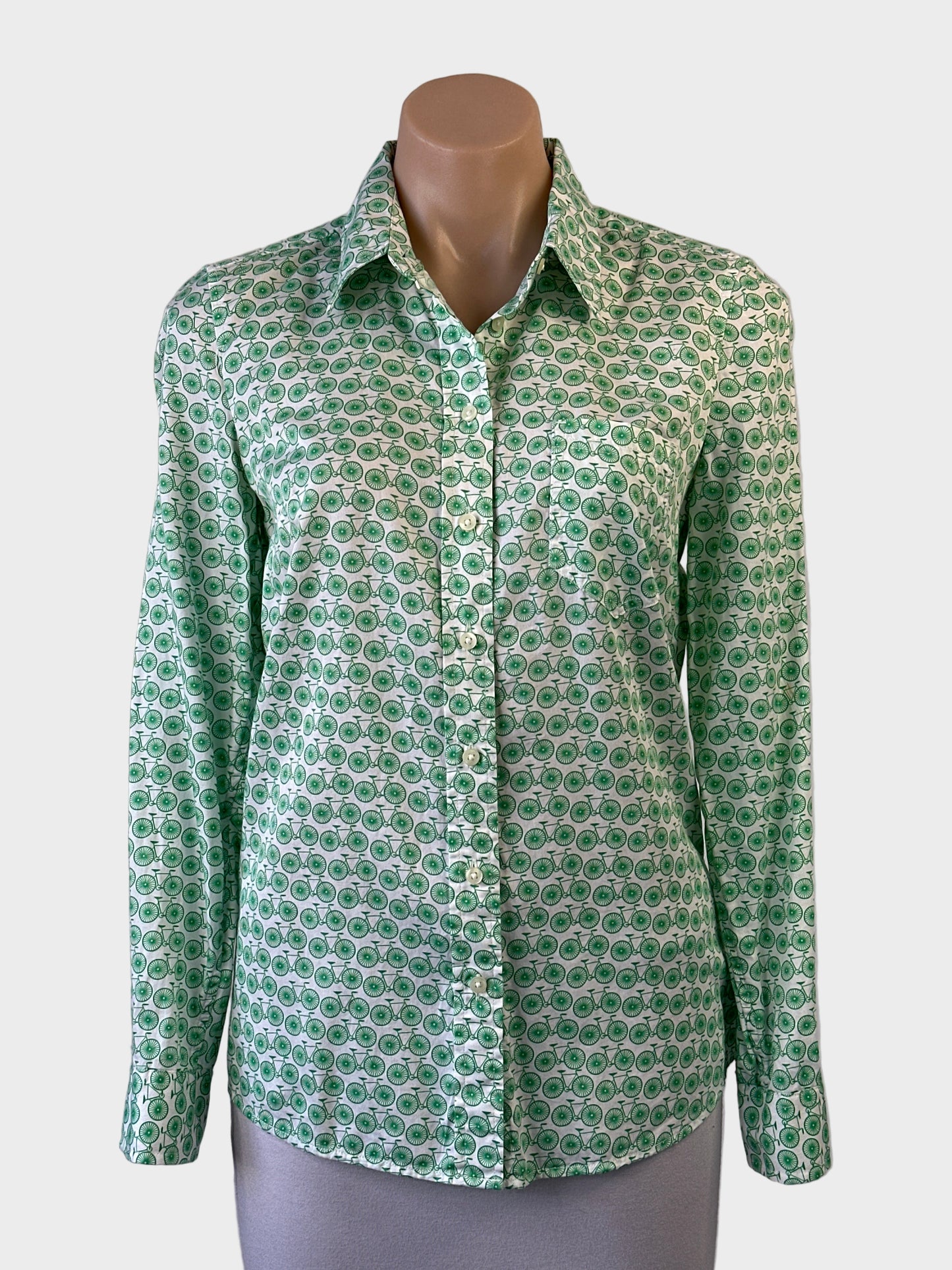 GAP long sleeve shirt in white with green retro bicycle print, button front and curved hem for smart casual wear