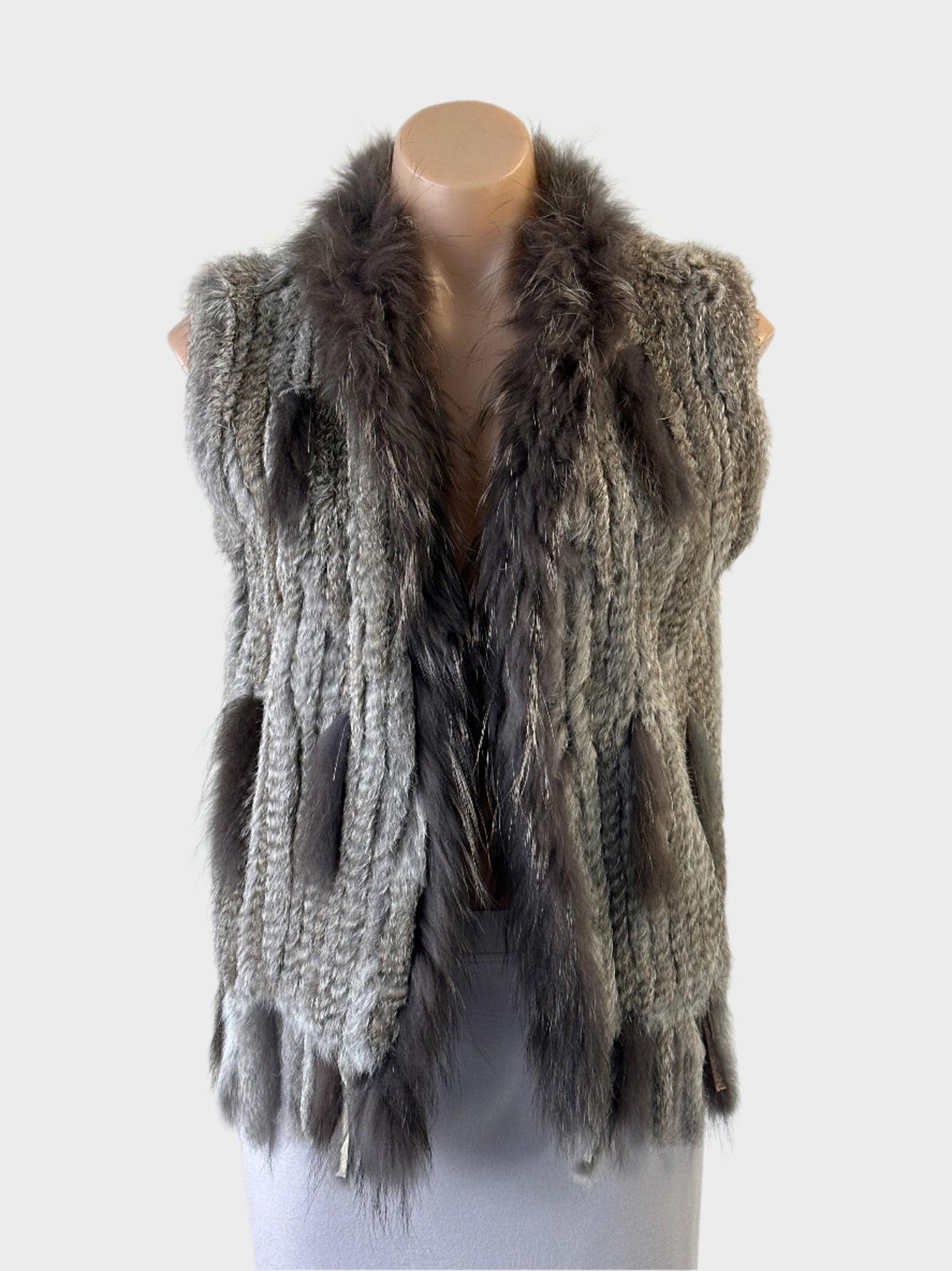 Heavenly open front vest in grey rabbit fur with appliqué and fringe hem for office or smart casual wear.