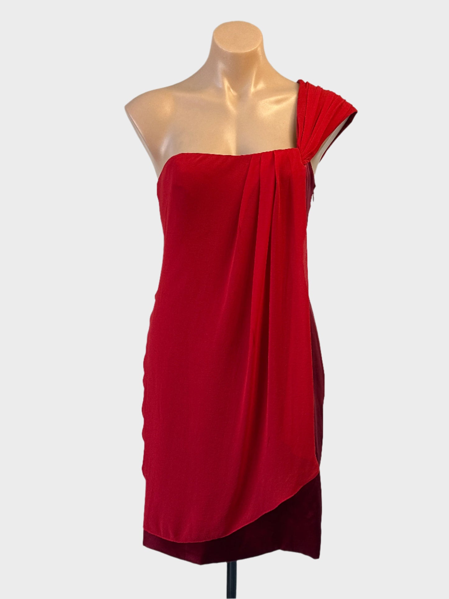 Karen Millen sleeveless asymmetric dress in red silk satin with draped overlay for formal or evening wear.