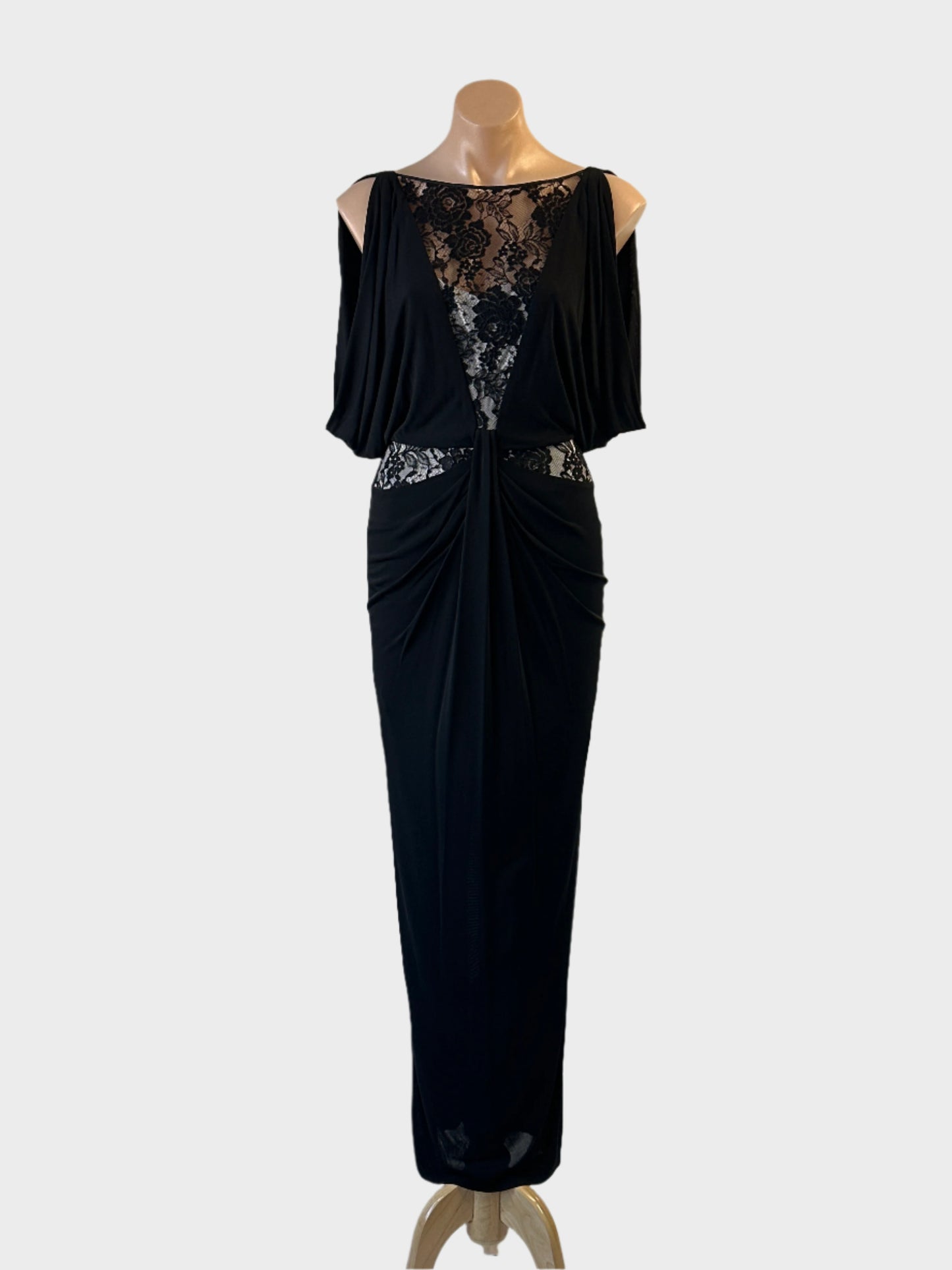 Designer Karen Millen gown in black jersey with lace insert and pleated skirt for formal wear.