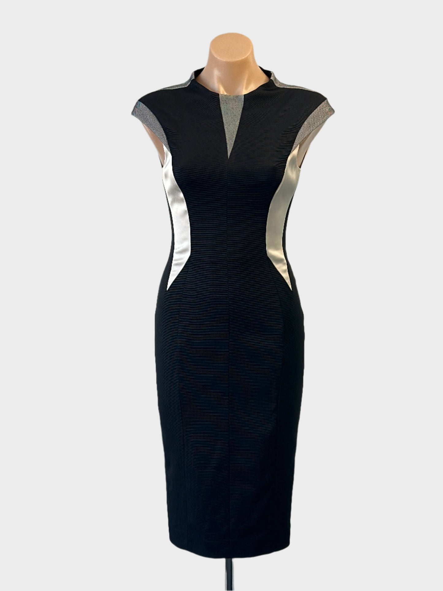 Karen Millen sleeveless sheath dress in black and white ribbed weave with satin and mesh inserts for evening or formal wear.
