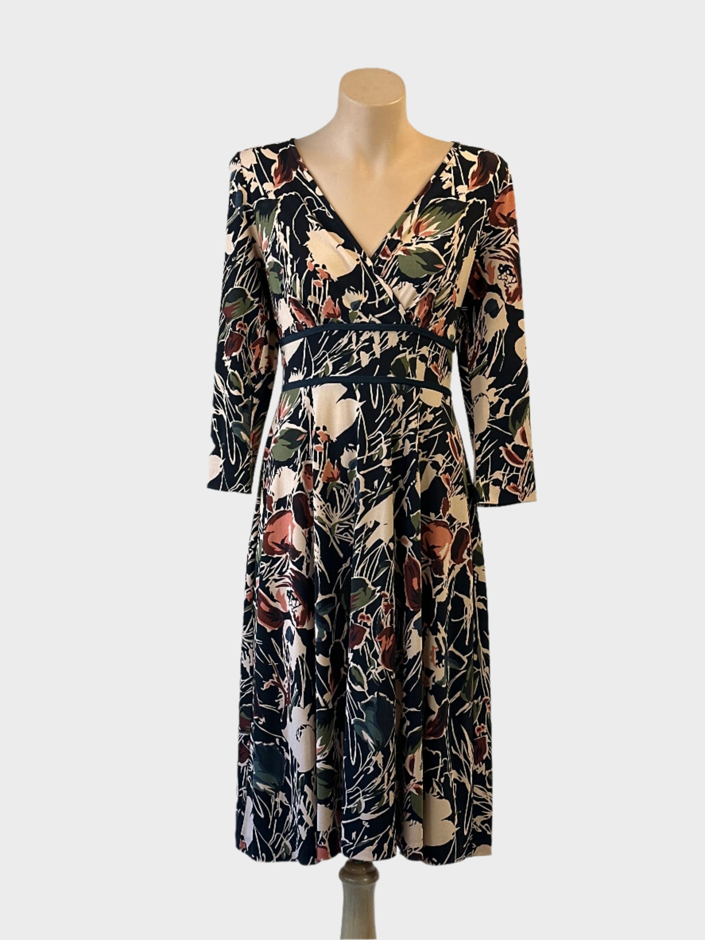 Leona Edmiston dress in black with beige floral print, three quarter sleeves and flared skirt for office or smart casual wear.