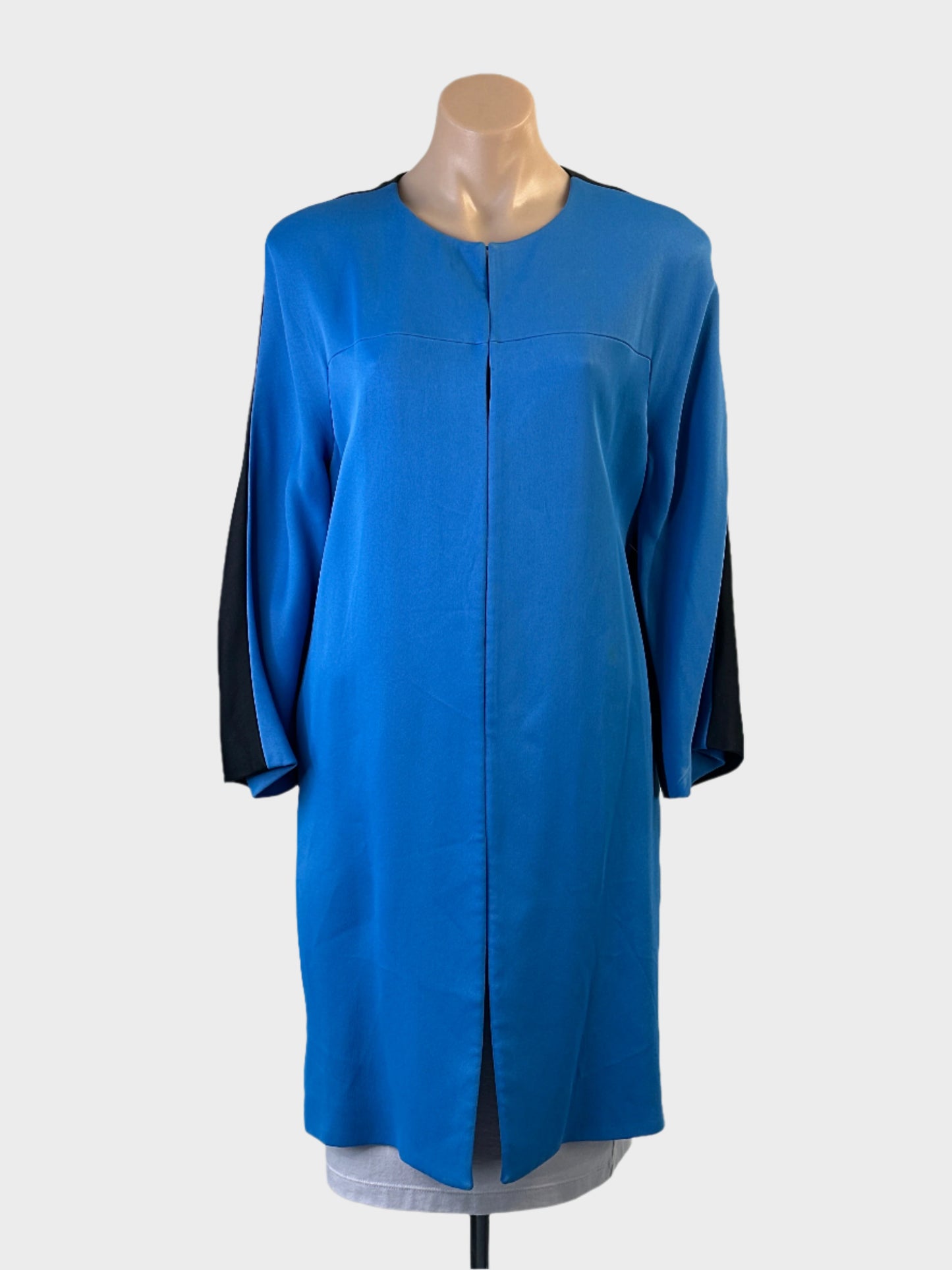 Designer Lisa Perry frock coat in blue and black with shoulder yoke and contrasting back for office or special events wear.