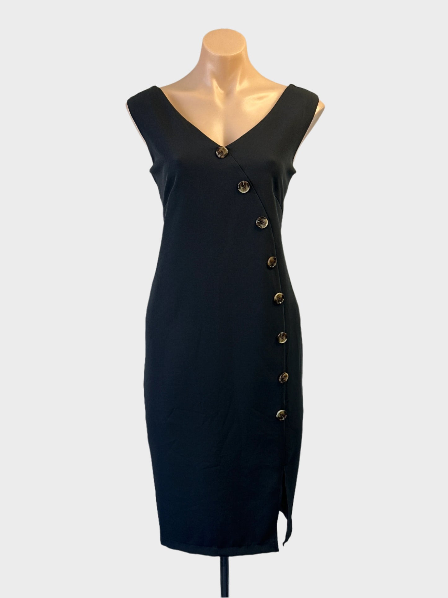 Liz Jordan sleeveless coat dress in black with decorative button front for office wear.