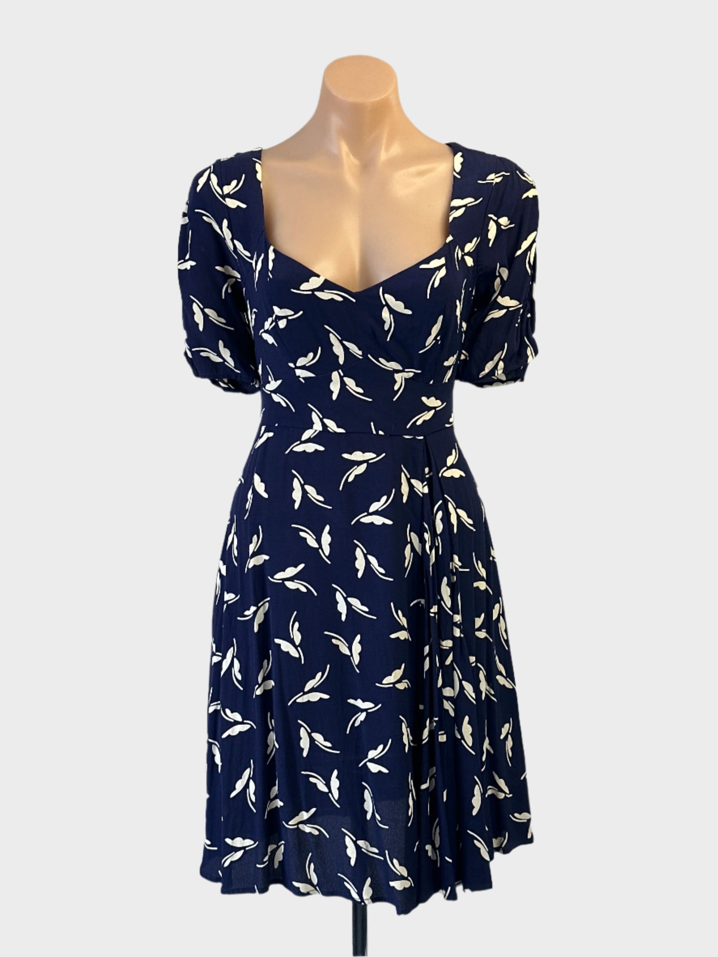 Maeve retro 40's swing style A-line dress in navy and white botanical print for special events or smart casual wear.