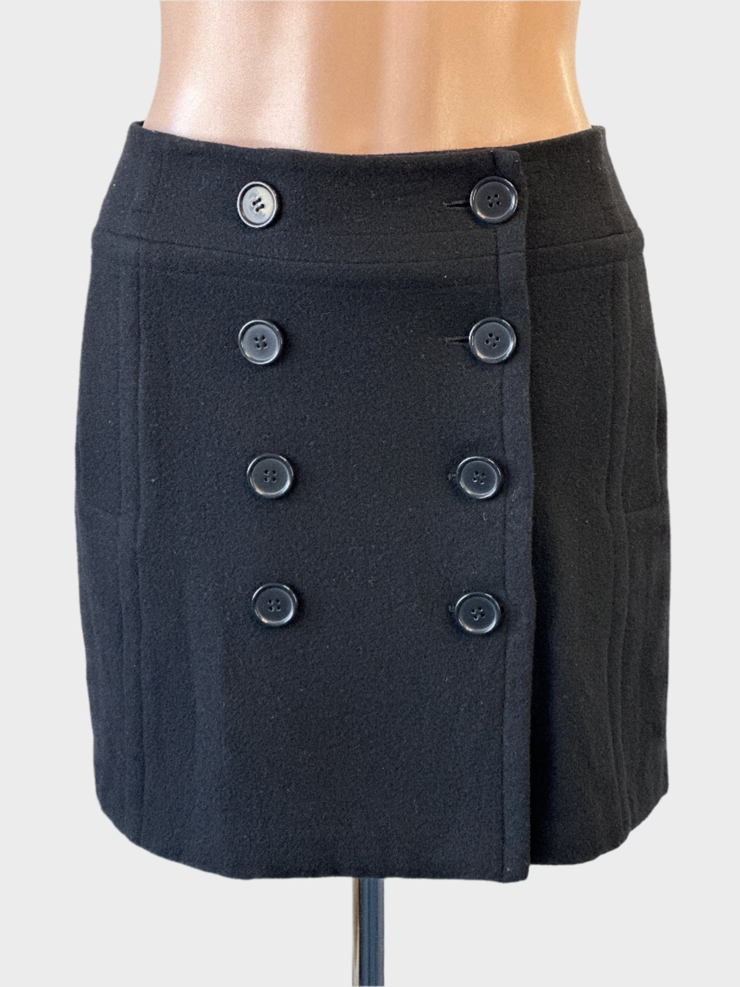 MARCS black wool blend retro 60's hip skirt with button front and welt pockets for smart casual wear.