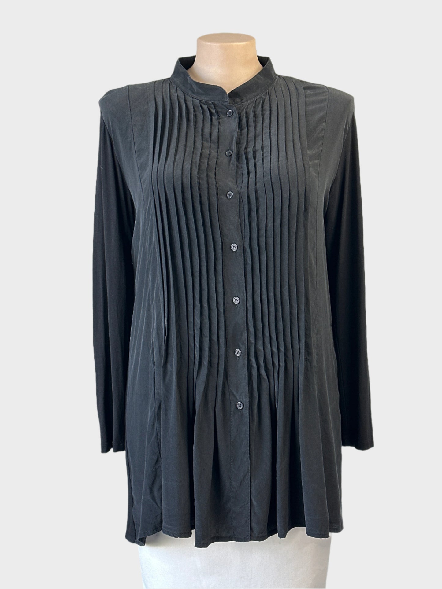 Designer Mela Purdie black long line shirt in pure silk with contrasting jersey back and pin tuck front panel for office wear