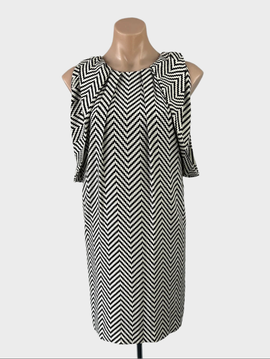 Designer MIMOSA black and white shift dress with chevron stripe print, cowl armholes, and straight skirt for office wear.