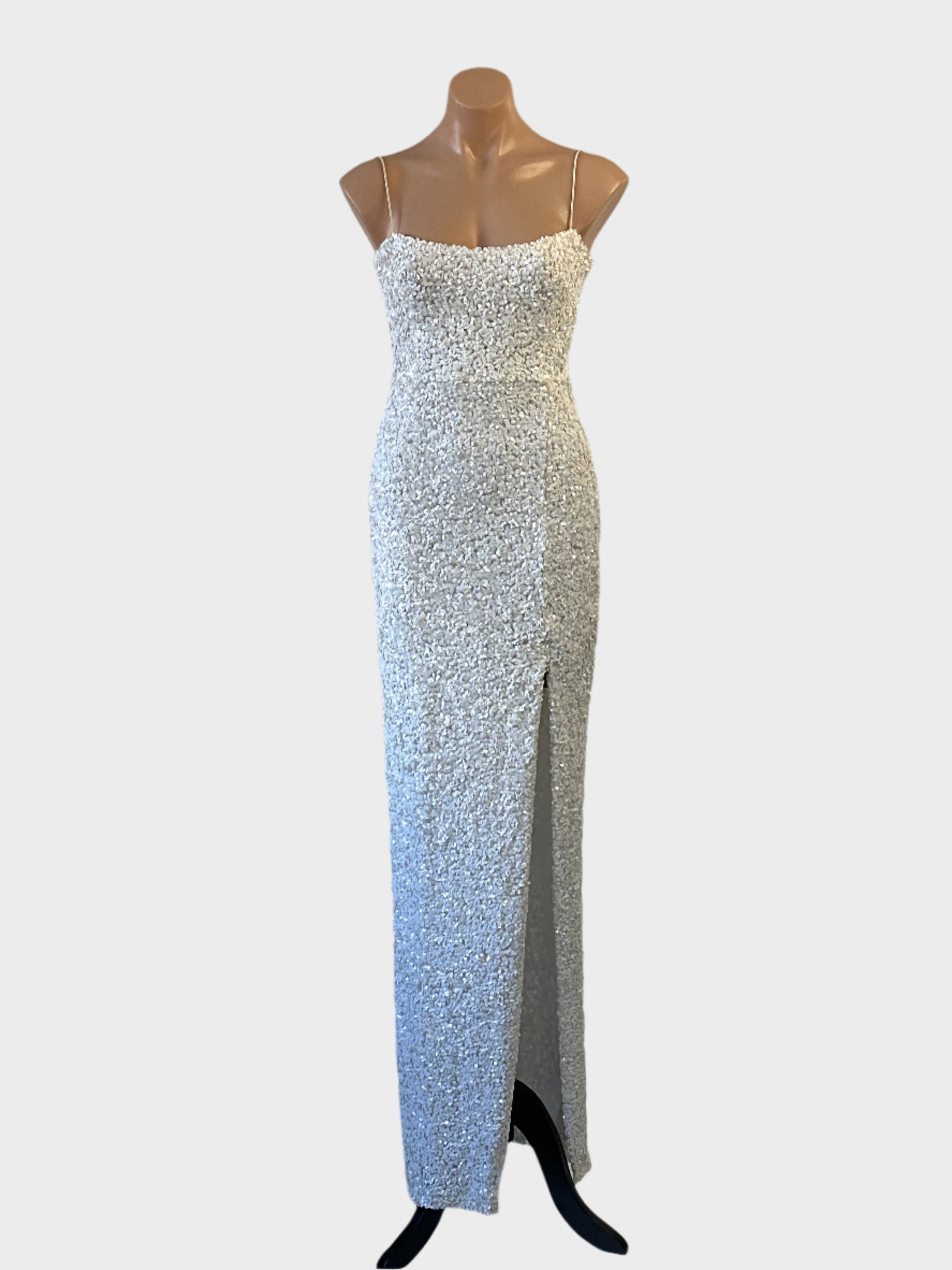Nookie white fully sequinned sleeveless gown with spaghetti straps and goddess skirt with thigh high split for formal wear.