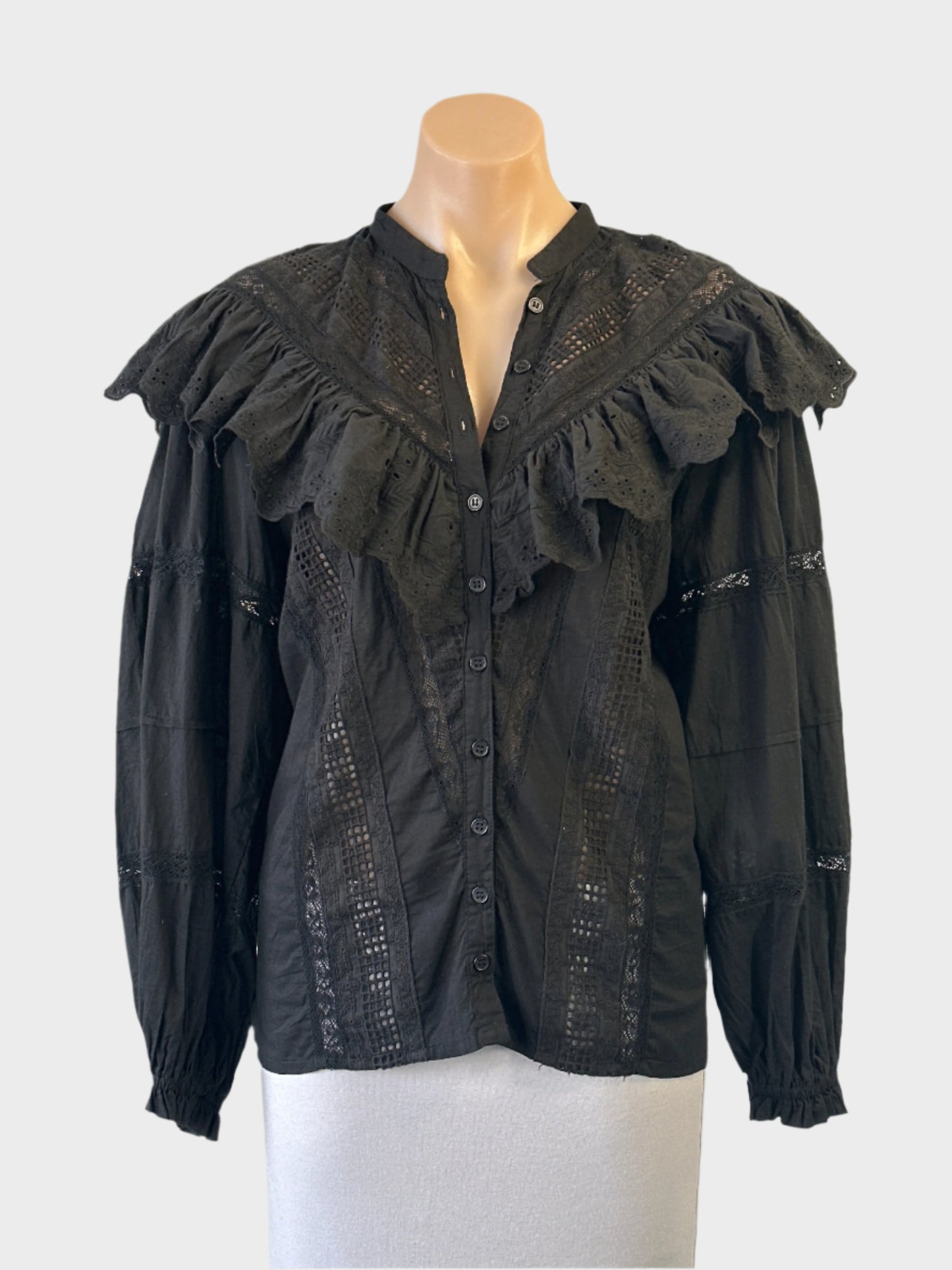 Desisgner Palm Noosa black boho style shirt with guipure lace inserts, broderie anglaise ruffle, and mandarin collar for smart casual wear.