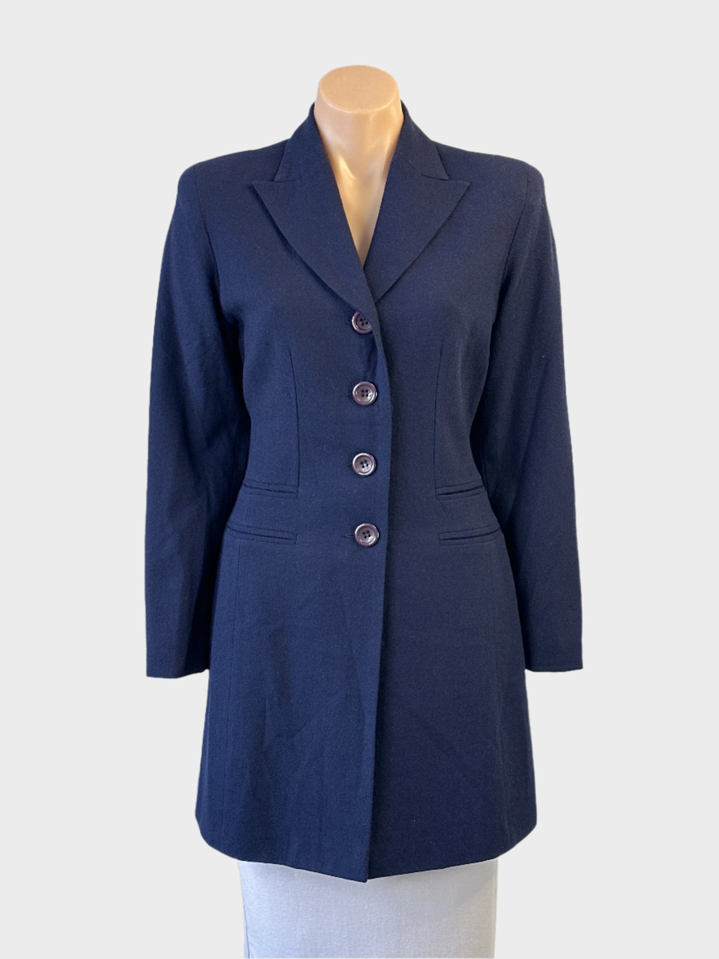 Designer Paola Calo navy blue single breasted wool jacket with notched lapels and welt pockets for office wear.