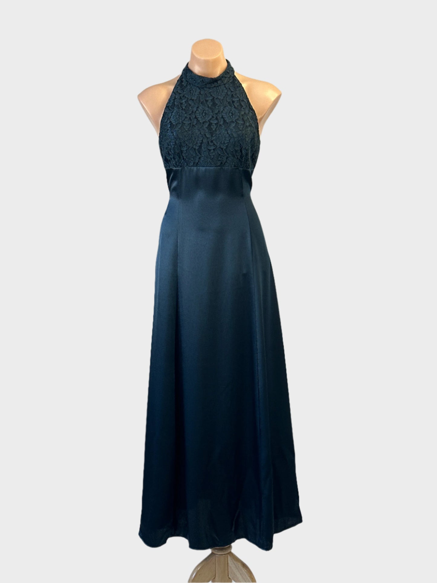 Purple Patch halter neck gown in blue satin with lace bodice for formal wear.