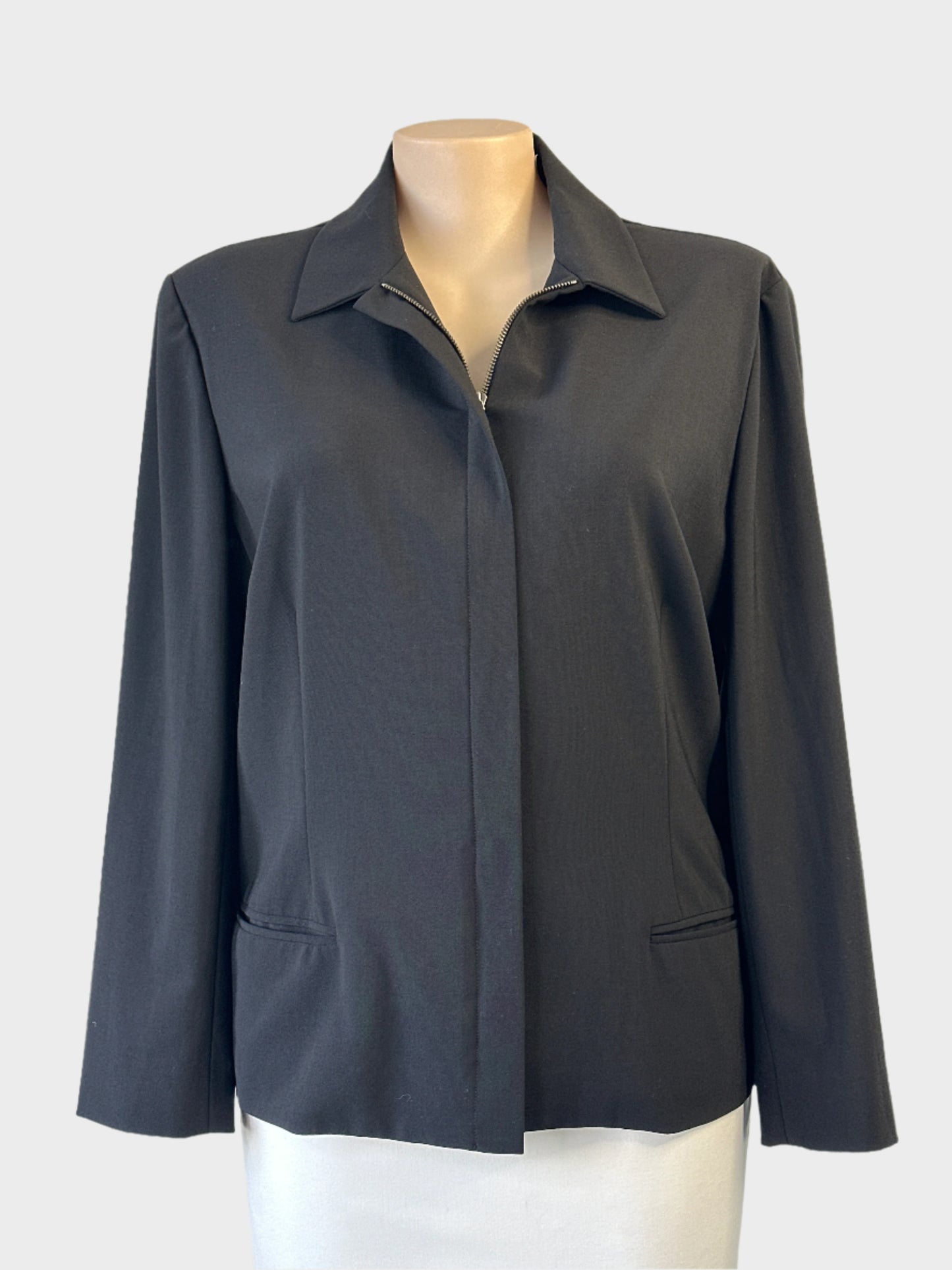 Designer Ralph Lauren black jacket with concealed zip front, surgeon's cuffs and jetted pockets for office wear.