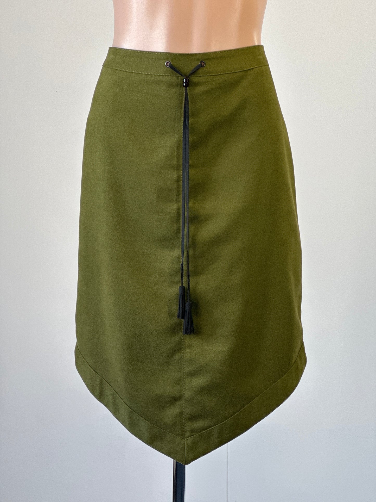 Review green faux suede Native North American inspired skirt with pointed hem for smart casual or office wear.
