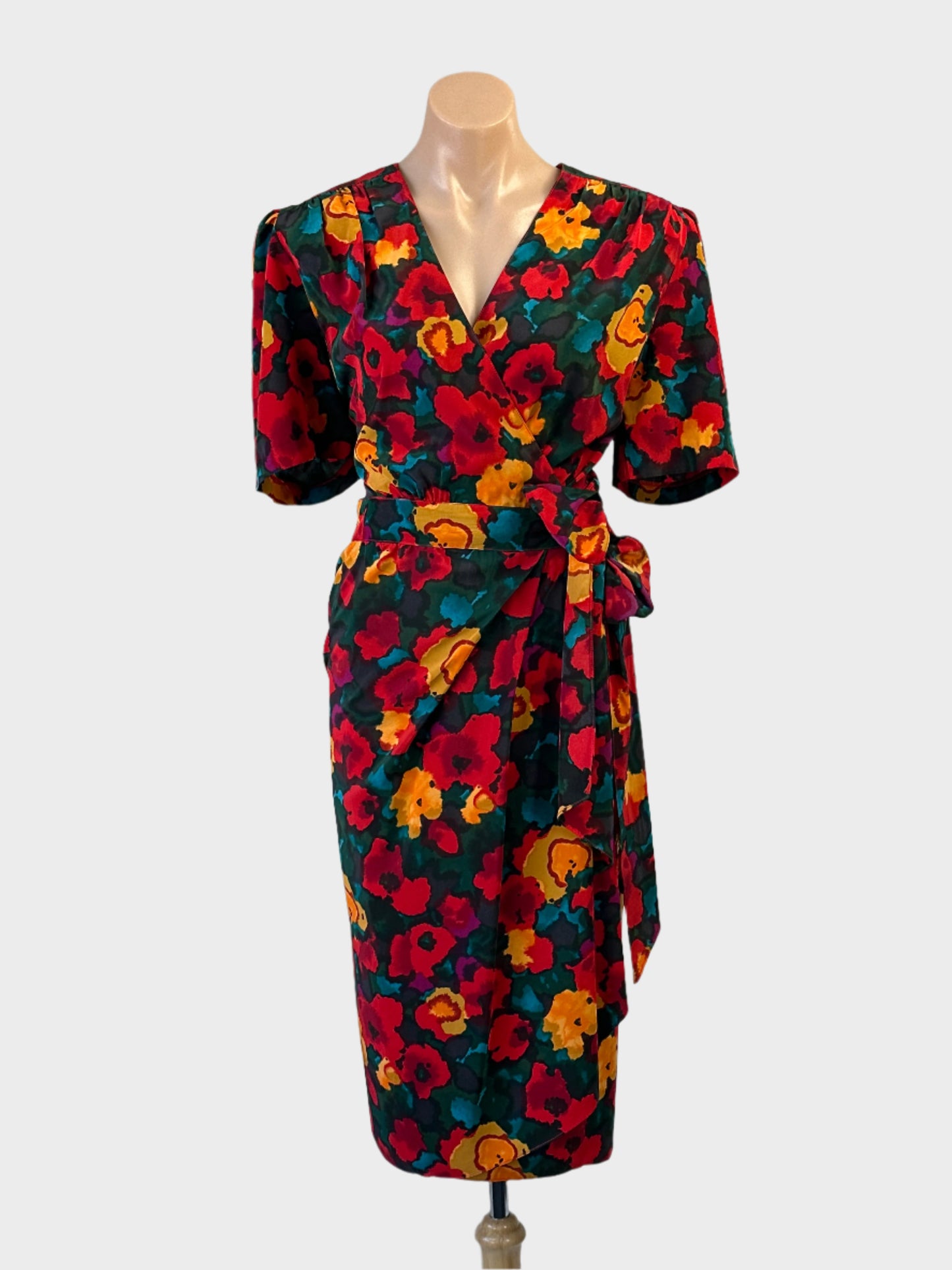 Designer Sally Browne wrap dress in red and green with surplice neck and tulip skirt for office or special events wear.