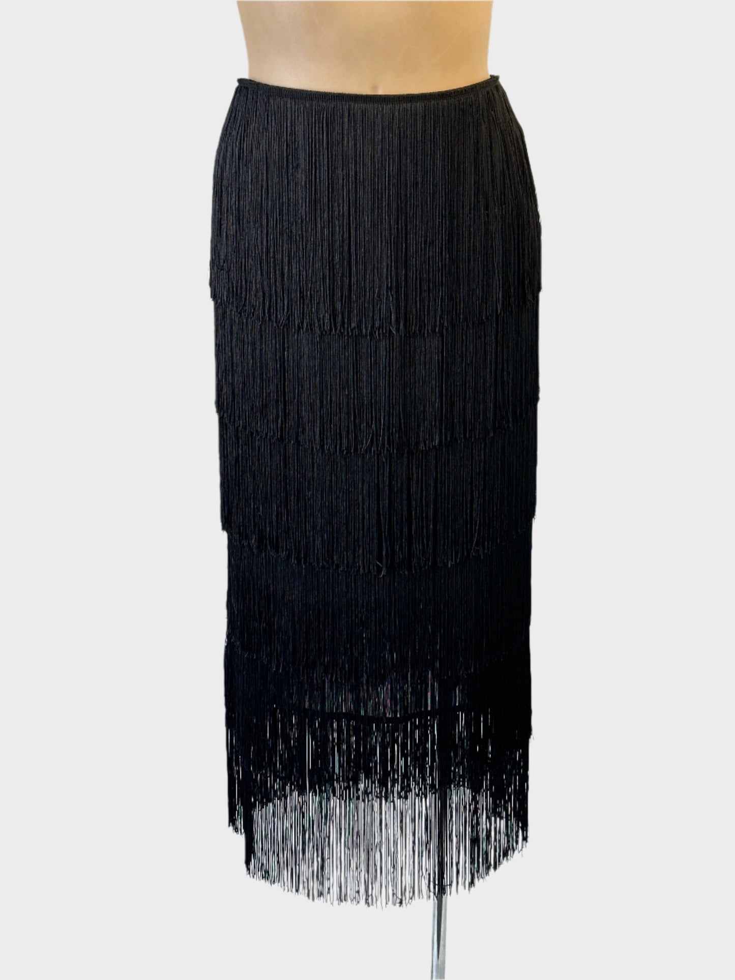 Showpo fringe skirt in black with satin yoke and layers of fringe for evening or formal wear.