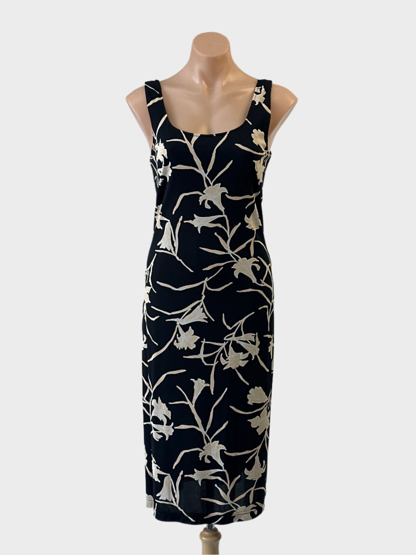 Simona floral shift dress in black with D-shaped neck and back for office or special events wear.