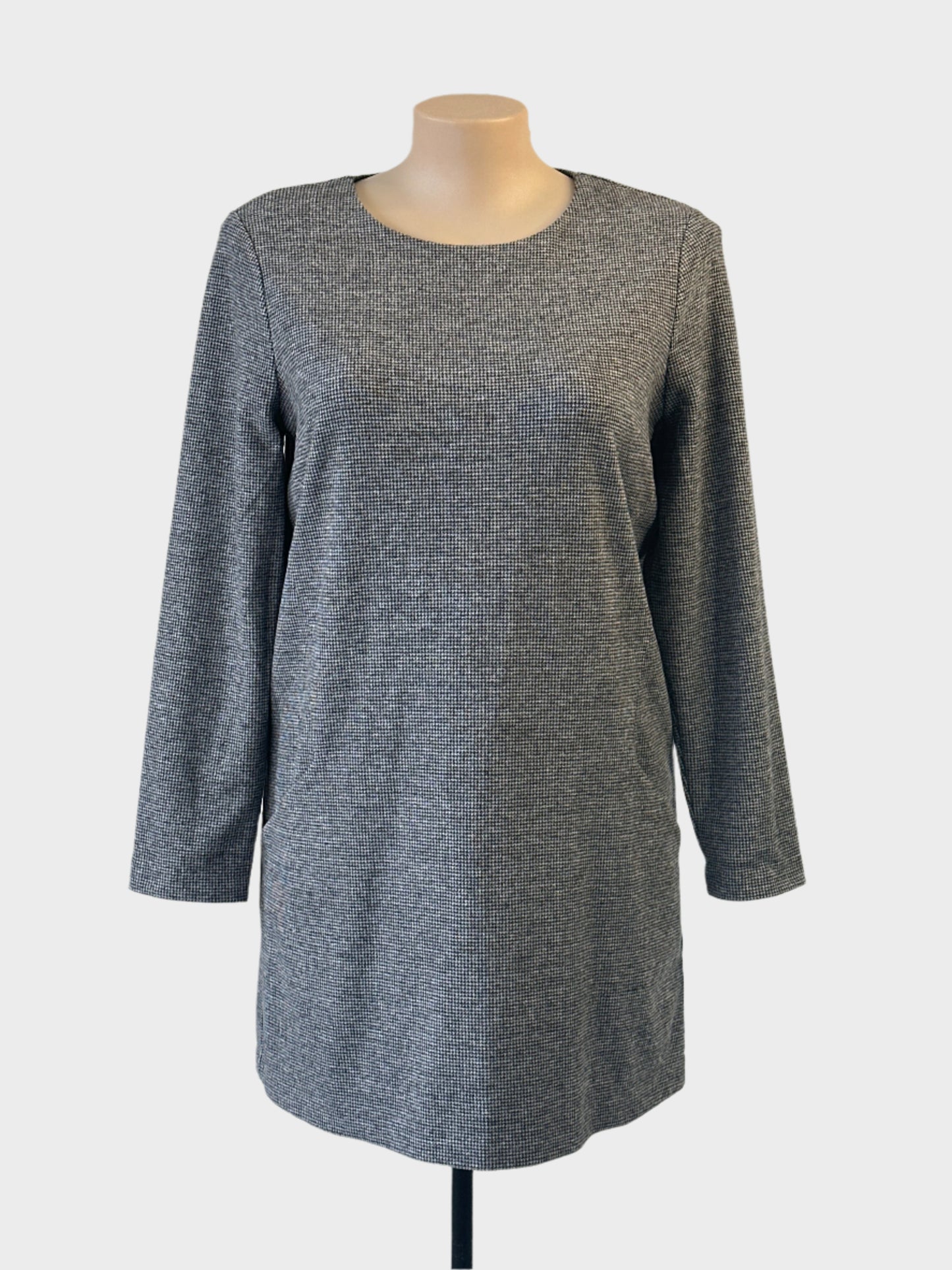 Sussan houndstooth shift dress in grey with round neck and slash pockets for office wear.