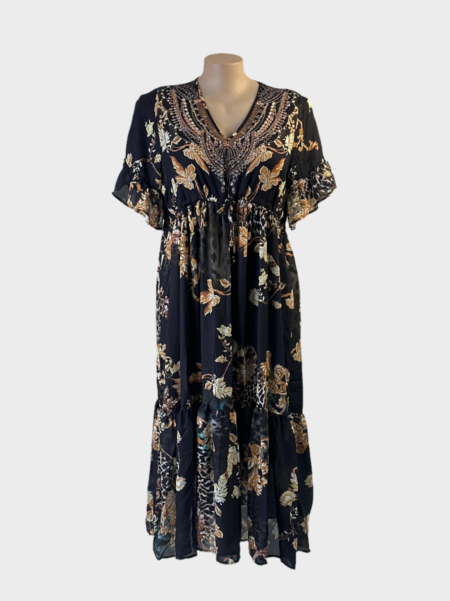 Taking Shape black and yellow blouson dress with leopard and floral patterns and rhinestone v-neck for evening or special events.
