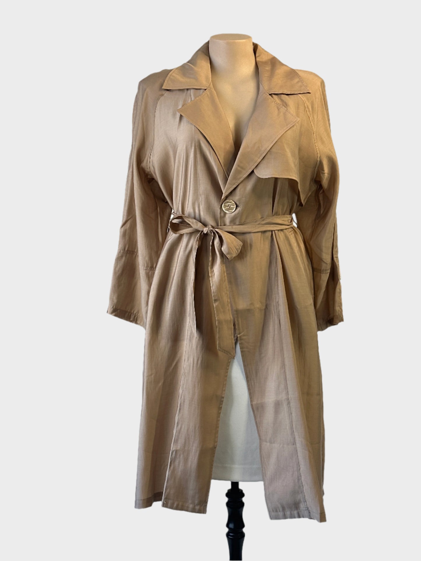 Taking Shape trench coat in latte with notch lapels, tie front, and storm flap — ideal for smart casual or office wear.