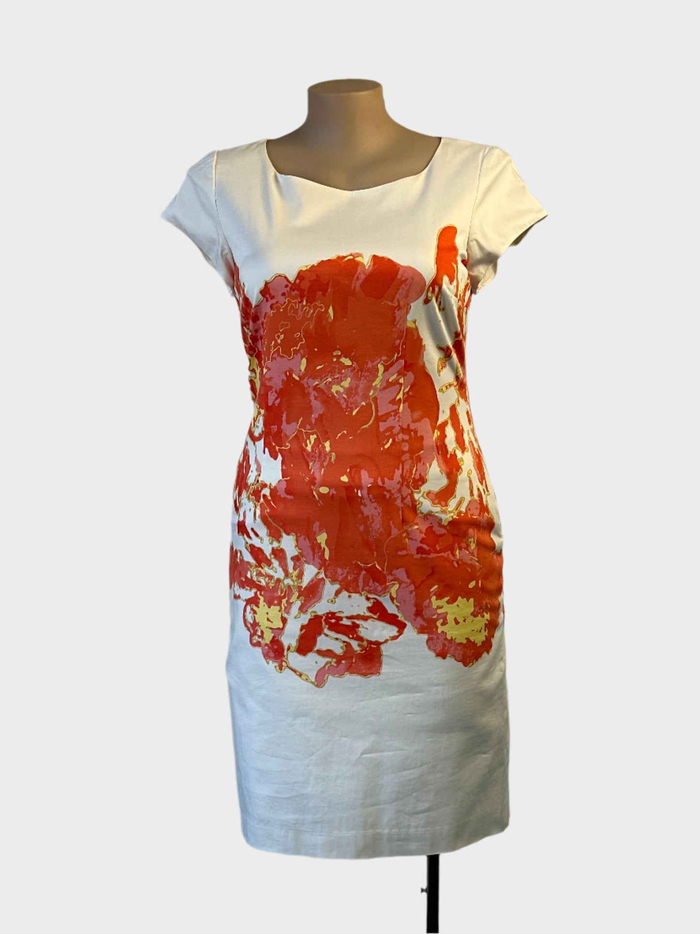 Designer Trent Nathan shift dress in white and orange abstract print with cap sleeves for office or special events wear.