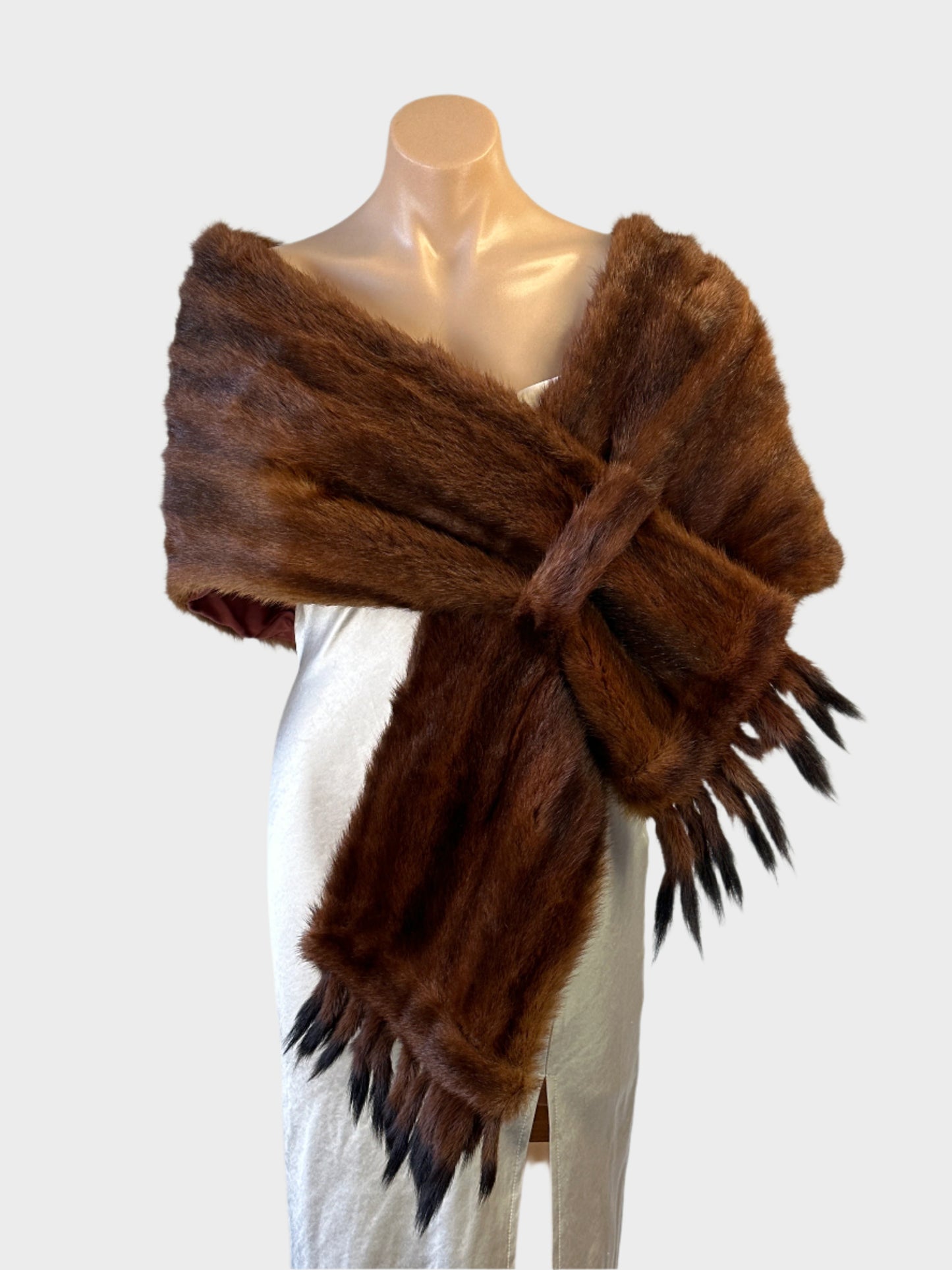 Vintage 30’s fur stole with sculpted shoulders, slip-through front and dark tipped tails for formal or evening wear