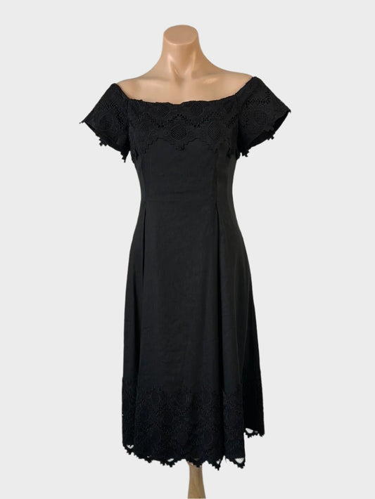 Country Road off the shoulder black dress in linen blend with guipure lace flounce neck, cap sleeves, and pleated skirt for smart casual wear.