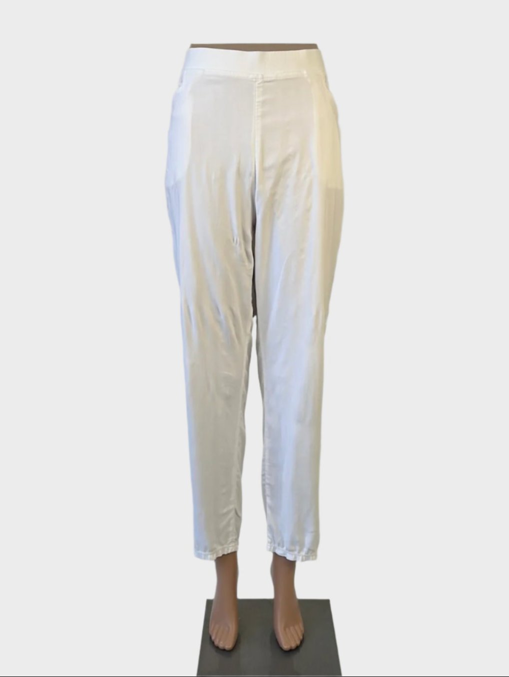 Designer Ricki Renee classic white straight leg pants with high rise elasticated waist, slash front pockets, and patch back pockets for smart casual wear.