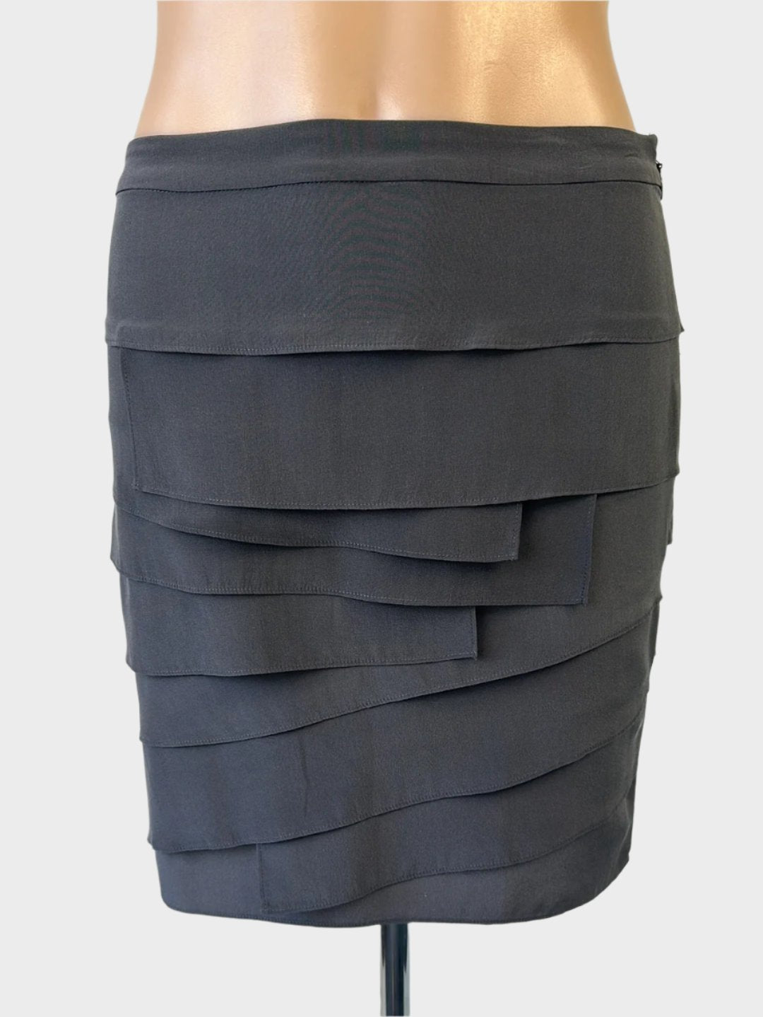 Designer Ann Taylor layered mini skirt in grey silk with a narrow waistband, ideal for special events or evening wear.