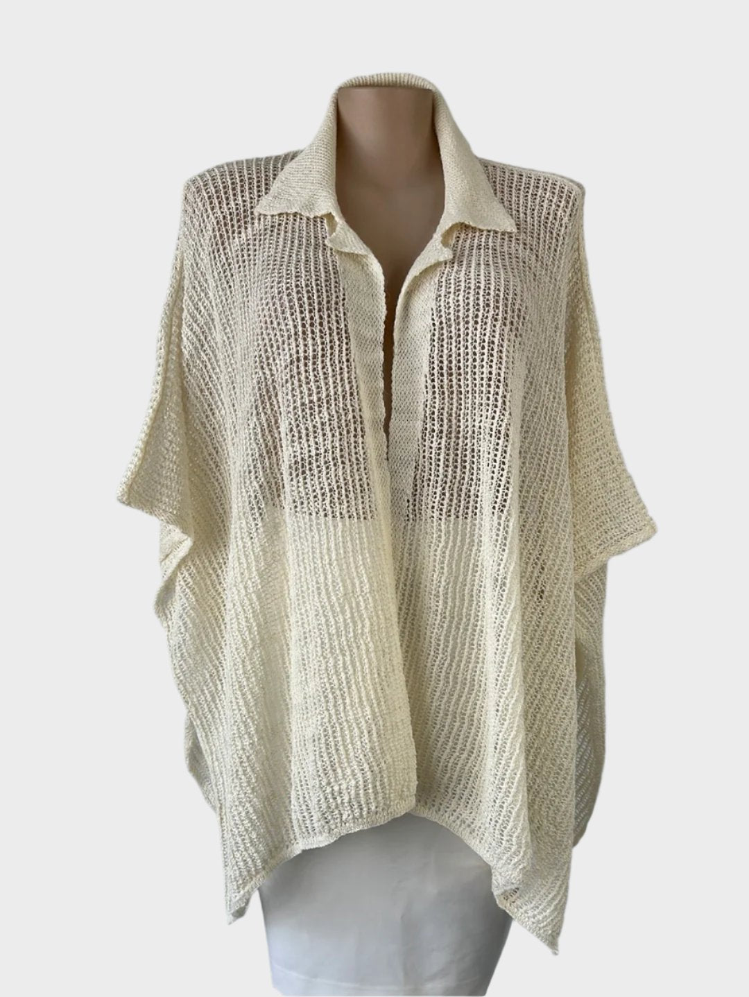 Designer Sara Pacini classic cream crochet shawl featuring a notched collar for smart casual or office wear.