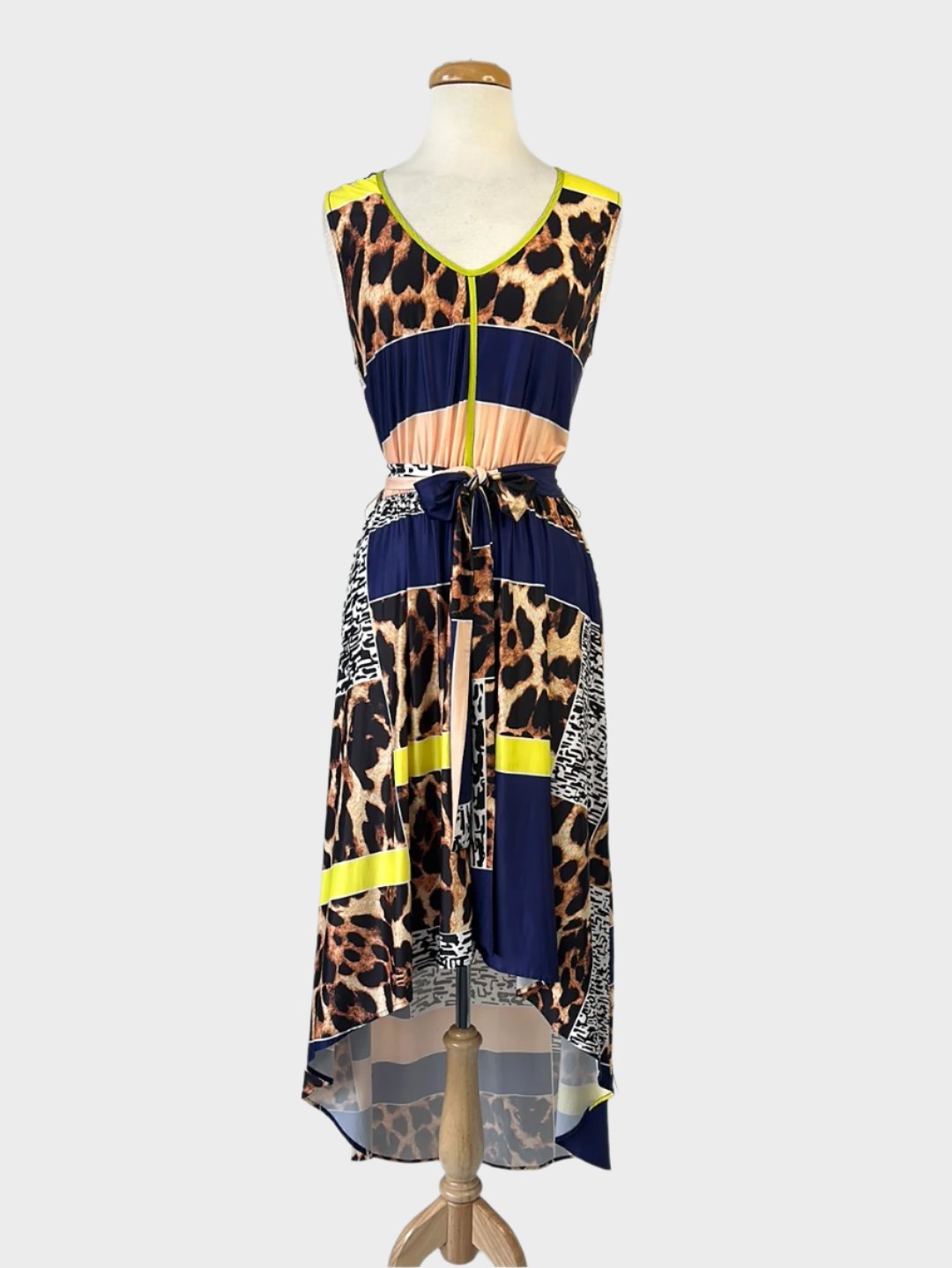 Designer Charlie Brown vintage 90's sleeveless jersey dress with leopard and colour block print, v-neck, v-back, sash tie, and high-low hem for evening wear.