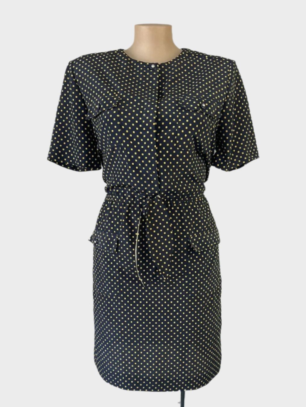 Vintage 80's shirt dress in navy and gold pin-check print with button-up front, flap pockets, round neck, bow tie waist, and straight skirt for office wear.