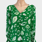 Country Road top in green and white abstract print with v-neck, balloon sleeves, banded button cuffs, and covered buttons for office or smart casual.