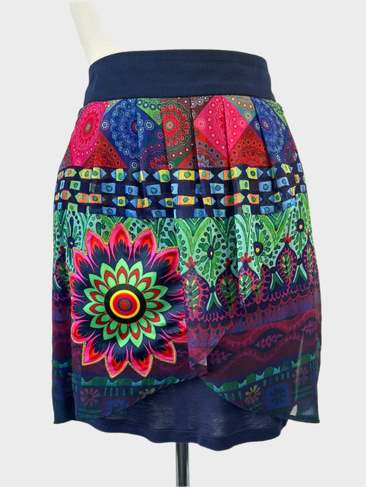 Designer Desigual pleated tulip skirt in multicolored sheer chiffon with Arabesque print and floral appliqué for smart casual or resort wear.