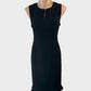 Designer Anna Thomas sleeveless sheath dress in black crepe with keyhole neck, ball button fasteners, and ruffle hem for office or evening wear.