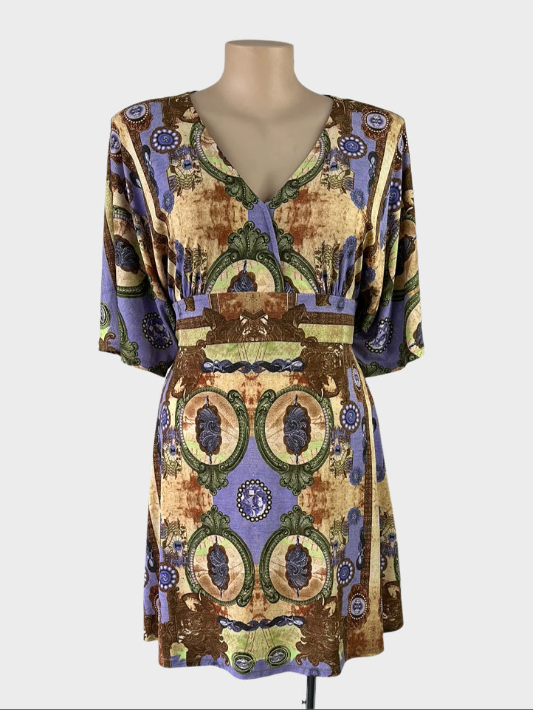 Designer Charlie Brown A-line dress in jersey with ornate Baroque print, v-neck, dolman sleeves, and flared skirt for smart casual or office wear.