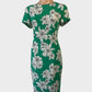 David Lawrence sheath dress in green and white crepe with floral print, cap sleeves, round neck, and straight skirt with back vent for office wear.